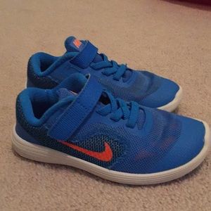 Blue and orange Nikes